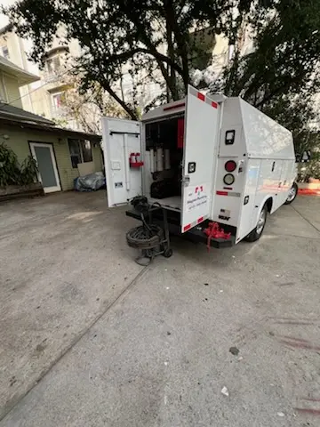 Magnet Plumbing service vehicle on-site for Grease Trap Cleaning in Millenia
